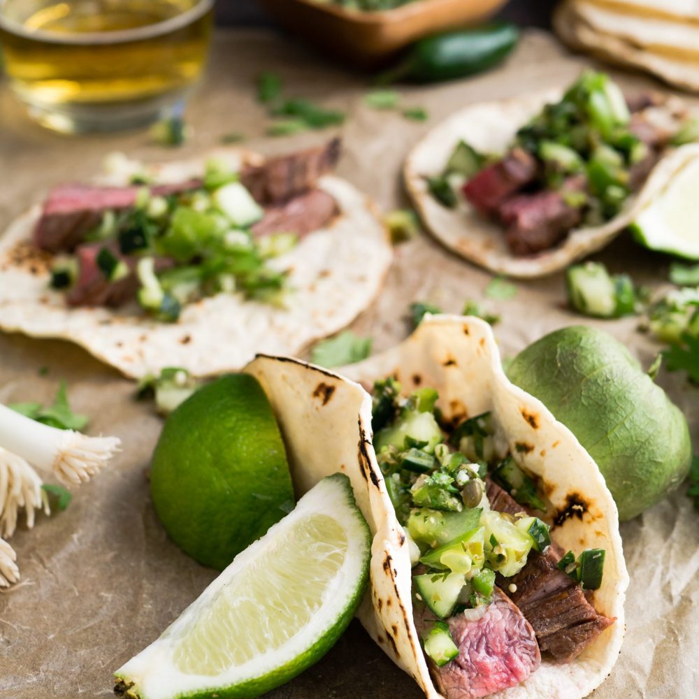I love this recipe for margarita marinated flank steak tacos and I love the festive, loose atmosphere of this photo. It makes me feel like I’m at a friendly, slightly chaotic party celebrating with friends on a warm evening. Dancing is bound to follow the meal.
